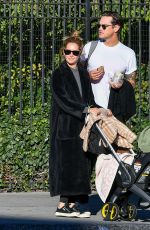 ASHLEY TISDALE and Christopher French Out with Their Baby in New York 10/16/2022
