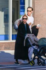 ASHLEY TISDALE and Christopher French Out with Their Baby in New York 10/16/2022