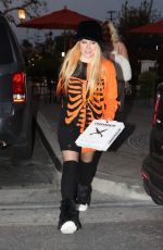 AVRIL LAVIGNE Arrives at Travis Barker