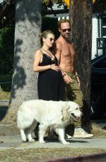 BECKI NEWOTN and Chris Diamantopoulos Out with Their Dog in Los Angeles 10/10/2022