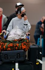 BELLA HADID Lands at Airport in Maimai 10/06/2022