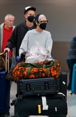 BELLA HADID Lands at Airport in Maimai 10/06/2022