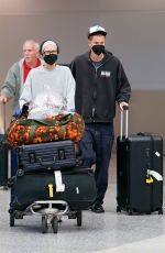 BELLA HADID Lands at Airport in Maimai 10/06/2022