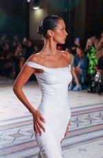 BELLA HADID Presents a Creation at Coperni SS23 Fashion Show in Paris 09/30/2022