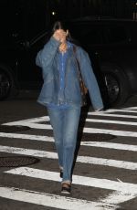 BELLA HADID Receives a Painting of Her Dad while Out in New York 10/10/2022