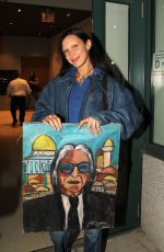 BELLA HADID Receives a Painting of Her Dad while Out in New York 10/10/2022