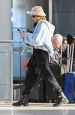 CARA DELEVINGNE Arrives at JFK Airport in New York 10/29/2022