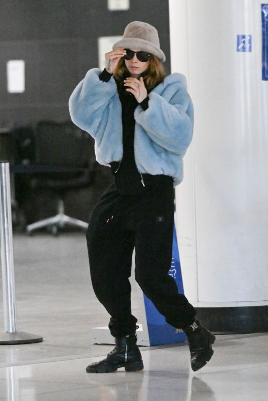 CARA DELEVINGNE Arrives at JFK Airport in New York 10/29/2022