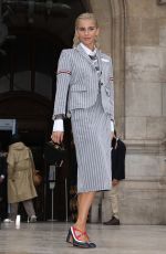 CAROLINE DAUR Arrives at Thom Browne SS2023 Fashion Show in Paris 10/03/2022