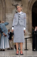 CAROLINE DAUR Arrives at Thom Browne SS2023 Fashion Show in Paris 10/03/2022