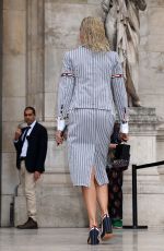 CAROLINE DAUR Arrives at Thom Browne SS2023 Fashion Show in Paris 10/03/2022