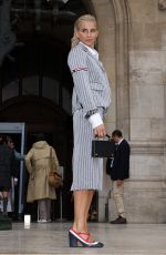 CAROLINE DAUR Arrives at Thom Browne SS2023 Fashion Show in Paris 10/03/2022
