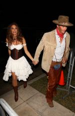 CINDY CRAWFORD and Rande Gerber Arrives at Casamigos Halloween Party in Beverly Hills 10/28/2022