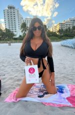 CLAUDIA ROMANI at a Photoshoot in Miami Beach 10/09/2022