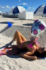 CLAUDIA ROMANI in Bikini Celebrates Halloween at Miami Beach 10/23/2022