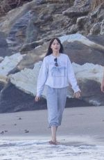 DAKOTA JOHNSON and Chris Martin Out at a Beach in Malibu 10/16/2022