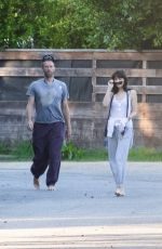 DAKOTA JOHNSON and Chris Martin Out at a Beach in Malibu 10/16/2022