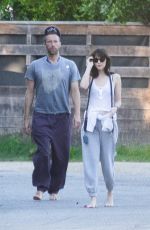 DAKOTA JOHNSON and Chris Martin Out at a Beach in Malibu 10/16/2022