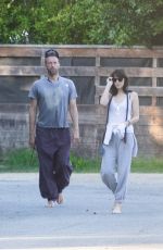DAKOTA JOHNSON and Chris Martin Out at a Beach in Malibu 10/16/2022
