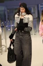 DUA LIPA in a Baggy Jeans Arrives at JFK Airport in New York 10/02/2022