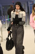 DUA LIPA in a Baggy Jeans Arrives at JFK Airport in New York 10/02/2022