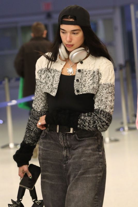 DUA LIPA in a Baggy Jeans Arrives at JFK Airport in New York 10/02/2022