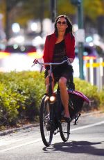 FAMKE JANSSEN Out Riding a Bike in New York 10/10/2022
