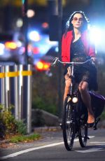 FAMKE JANSSEN Out Riding a Bike in New York 10/10/2022