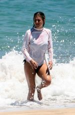 JENNIFER ANISTON in Bikini Takes Surf Lessons in Hawaii 08/23/2007