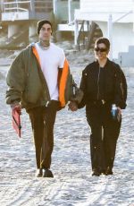 KOURTNEY KARDASHIAN and Travis Barker Celebrate Their 1st Anniversary at a Beach in Santa Barbara 10/17/2022