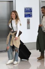 LEANN RIMES and Eddie Cibrian with Their Service Dog at LAX Airport 10/02/2022
