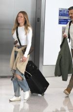 LEANN RIMES and Eddie Cibrian with Their Service Dog at LAX Airport 10/02/2022