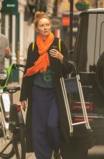 LILY COLE Out and About in London 10/41/2022
