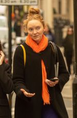 LILY COLE Out and About in London 10/41/2022