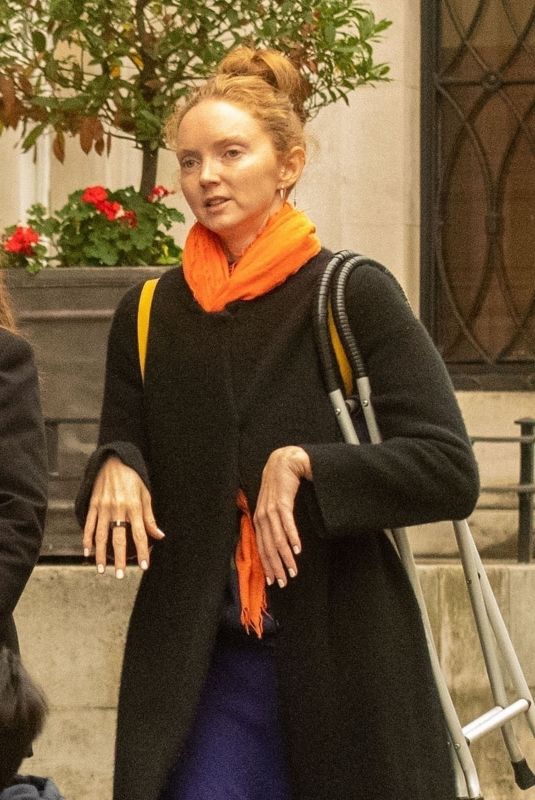 LILY COLE Out and About in London 10/41/2022