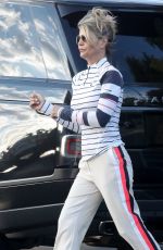 LORI LOUGHLIN at a Gas Dtation to Put Air in the Tire in Los Angeles 10/13/2022