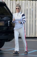 LORI LOUGHLIN at a Gas Dtation to Put Air in the Tire in Los Angeles 10/13/2022