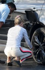 LORI LOUGHLIN at a Gas Dtation to Put Air in the Tire in Los Angeles 10/13/2022