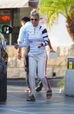 LORI LOUGHLIN at a Gas Dtation to Put Air in the Tire in Los Angeles 10/13/2022