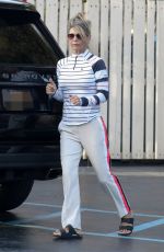 LORI LOUGHLIN at a Gas Dtation to Put Air in the Tire in Los Angeles 10/13/2022