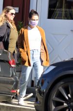 MILA KUNIS Leaves a Breakfast Meeting at Farmshop in Brentwood 10/18/2022