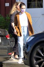 MILA KUNIS Leaves a Breakfast Meeting at Farmshop in Brentwood 10/18/2022
