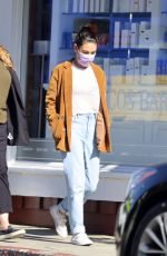 MILA KUNIS Leaves a Breakfast Meeting at Farmshop in Brentwood 10/18/2022