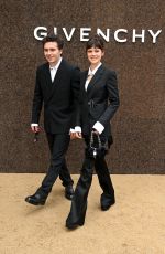 NICOLA PELTZ and Brooklyn Beckham at Givenchy Fashion Show in Paris 10/02/2022