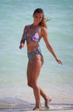 NINA AGDAL in Bikinis at a Photoshoot on the Beach in Miami 10/26/2022