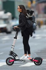 NINA DOBREV Out for Electric Scooter Ride in New York 10/10/2022