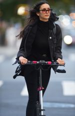 NINA DOBREV Out for Electric Scooter Ride in New York 10/10/2022