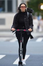 NINA DOBREV Out for Electric Scooter Ride in New York 10/10/2022