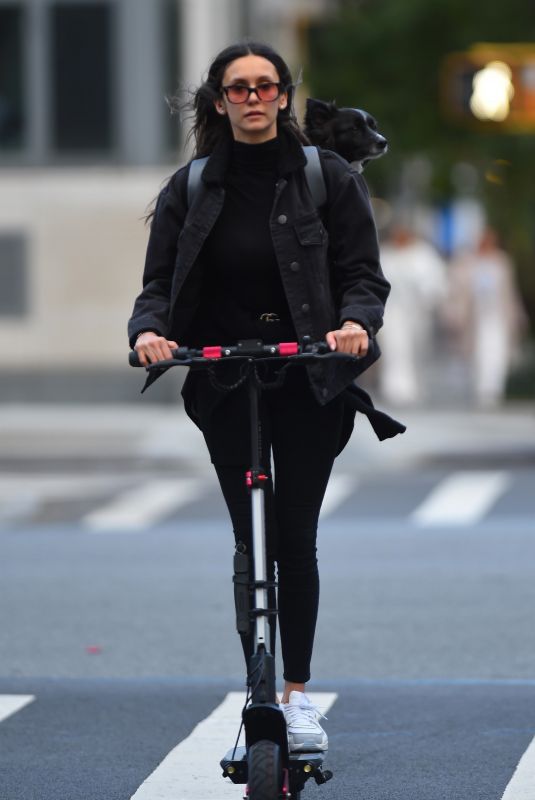 NINA DOBREV Out for Electric Scooter Ride in New York 10/10/2022