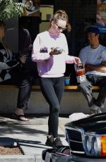 OLIVIA WILDE and Harry Style Out in Their Vintage Mercedes Benz in Los Angeles 10/25/2022